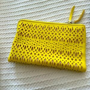 Stella & Dot laser cut clutch. Zips closed never used snaps together.